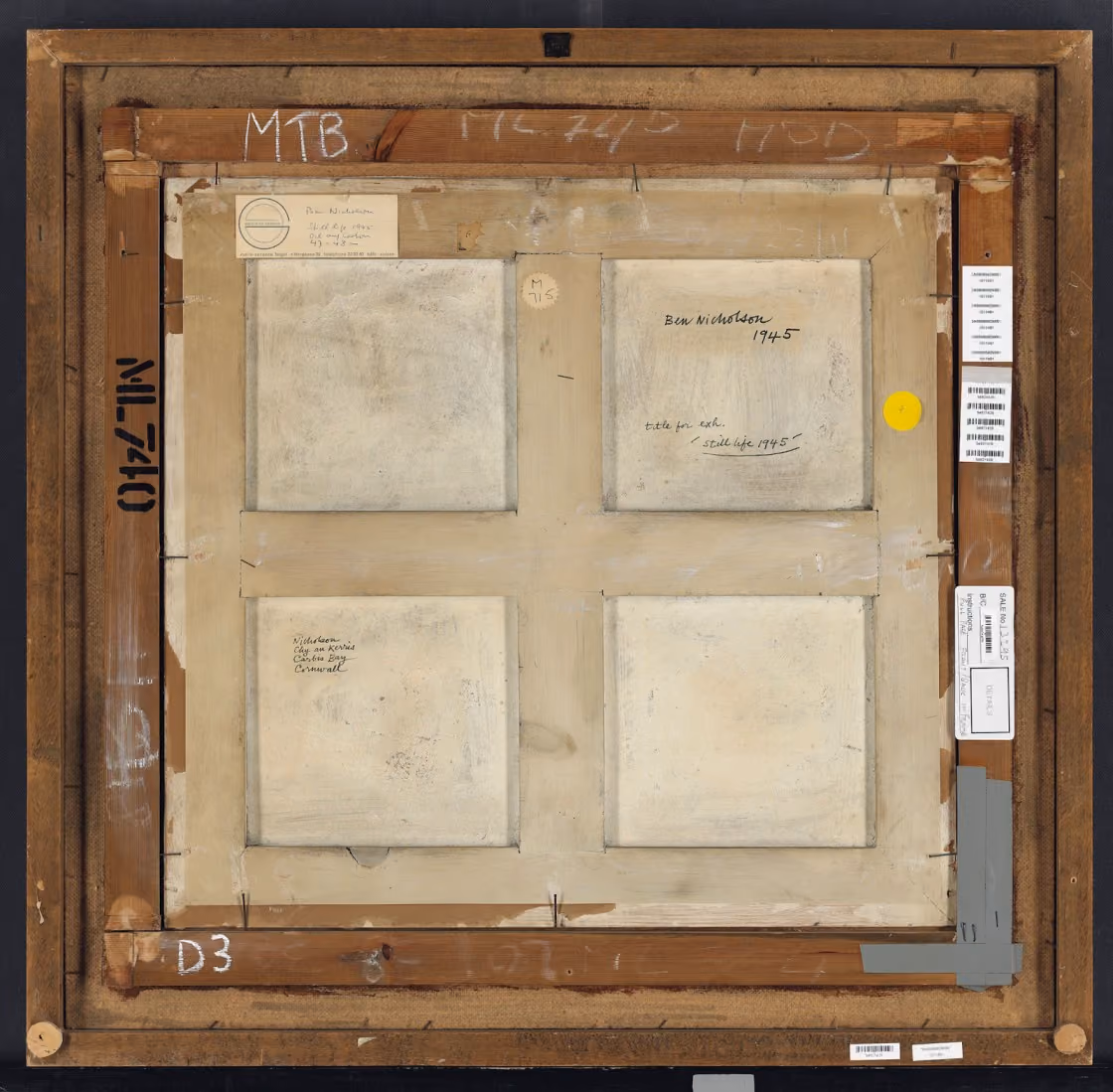 Back of a framed painting, revealing inscriptions and showing signs of archival documentation. Image courtesy of Joy Tahan Ruddell.