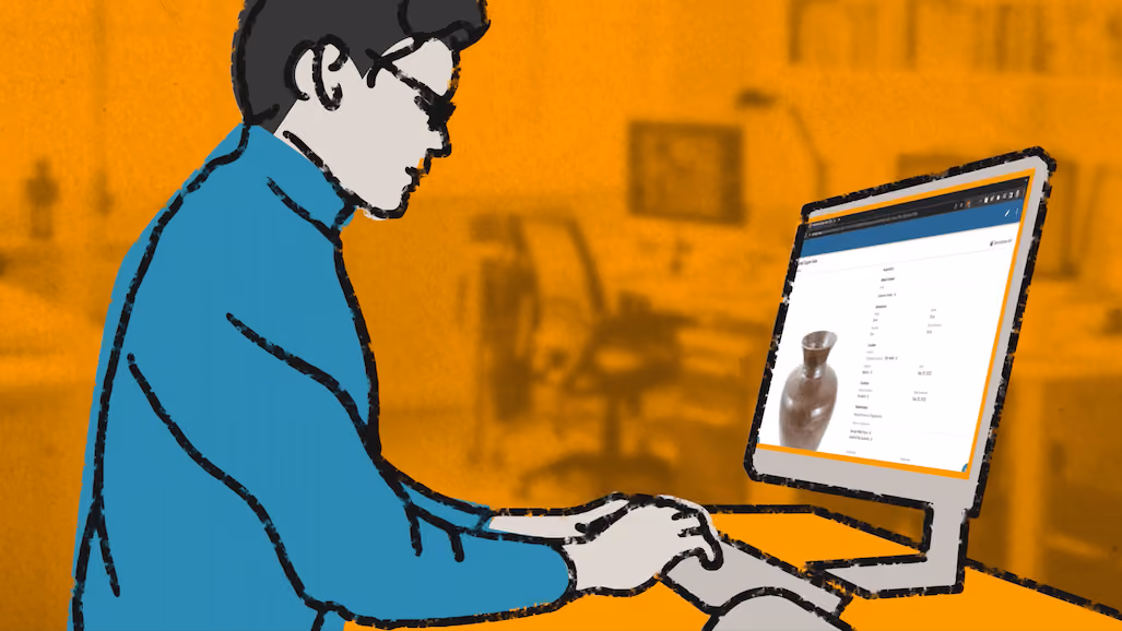 Illustrated depiction of a person at a desk using CatalogIt on a desktop computer.