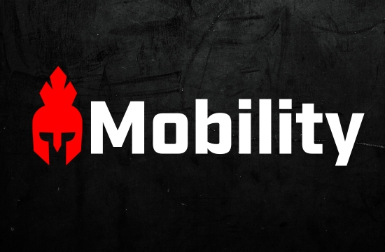 A young girl with weight on her back