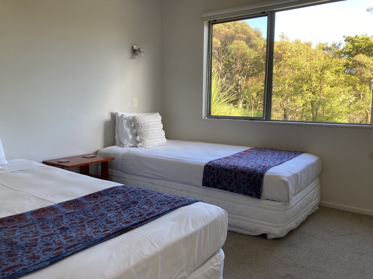 Twin bedroom with garden views