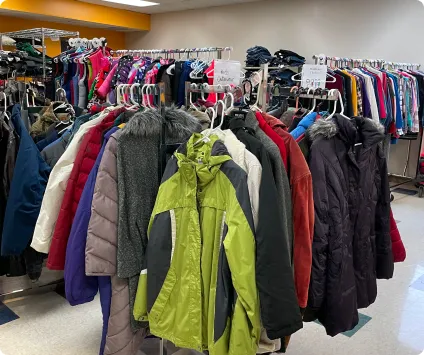 New heights church members voluntarily sorting clothes for distribution for charity