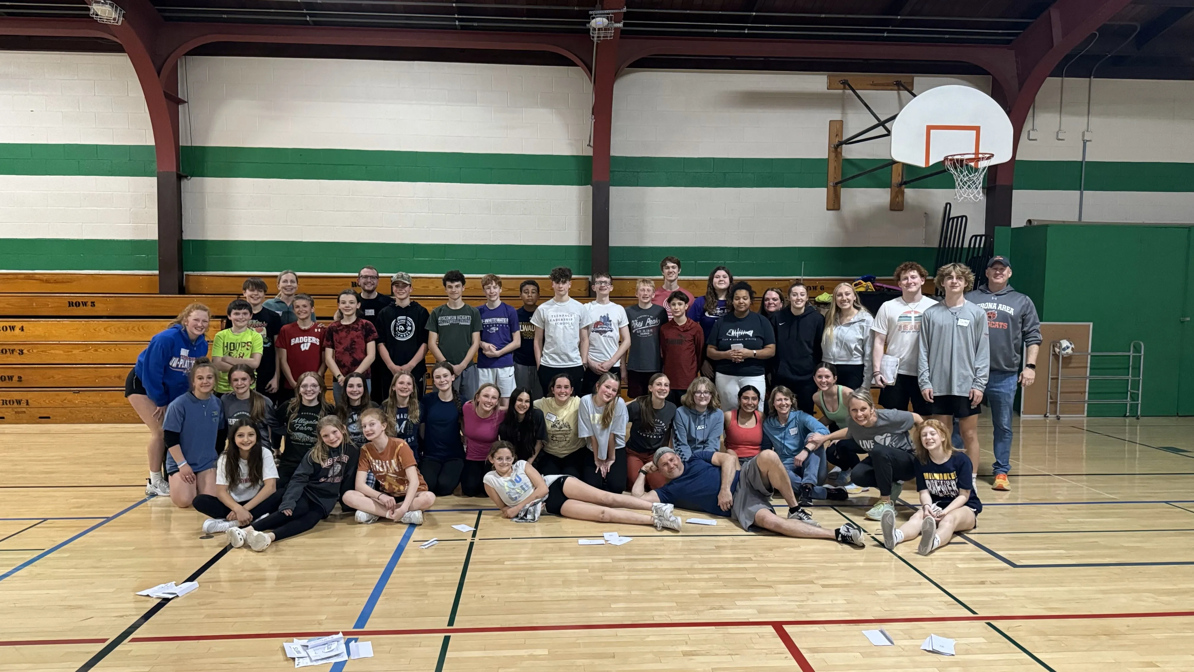 New Heights Church youth sits on graffiti wall