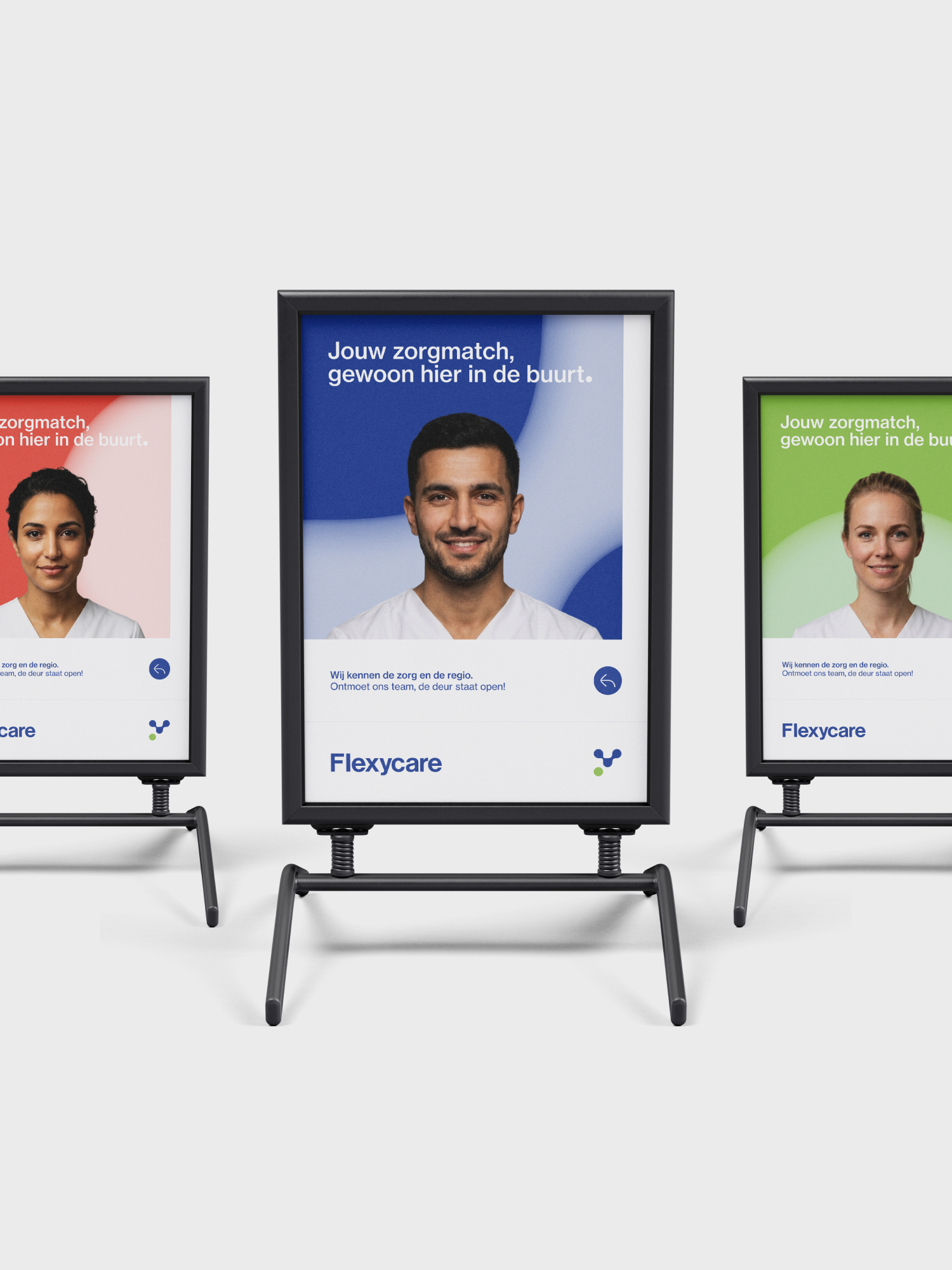 Three standing poster frames featuring diverse healthcare professionals with colored backgrounds and Dutch text promoting Flexycare.