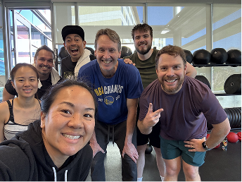 A group of Gymparty members posing together after a class