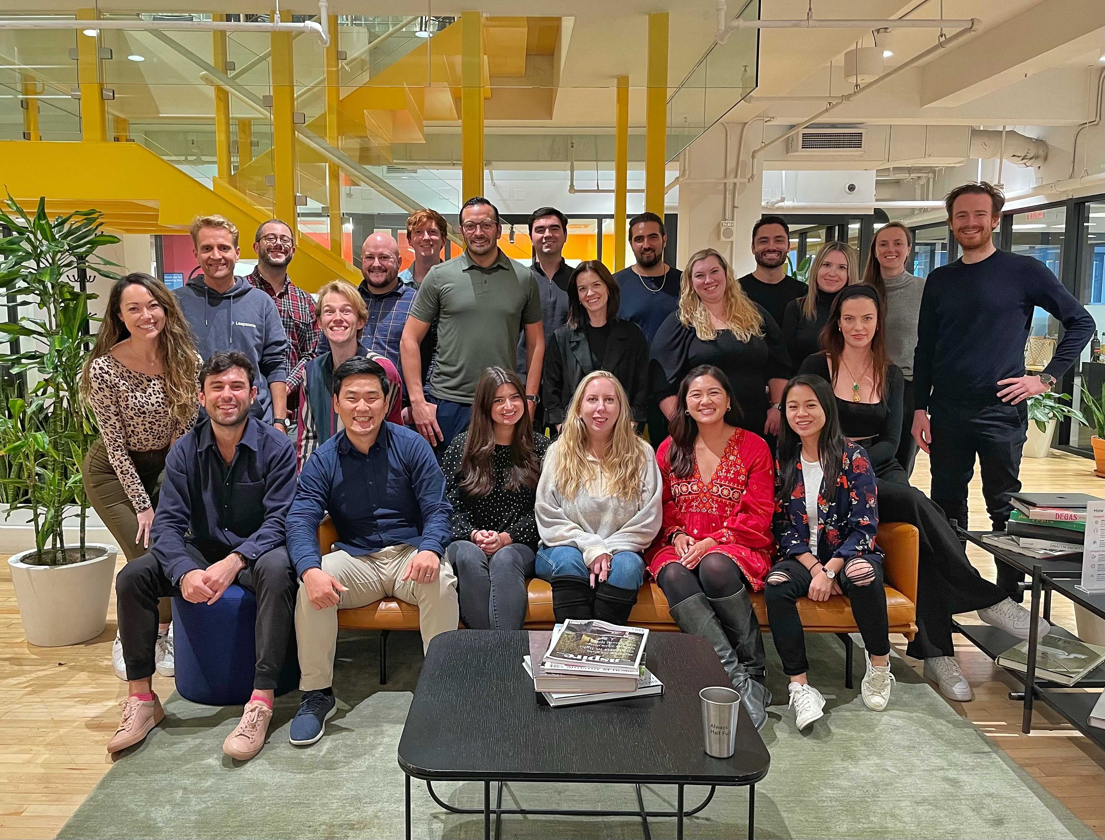 A group photo of the Leapsome NYC team in the new office