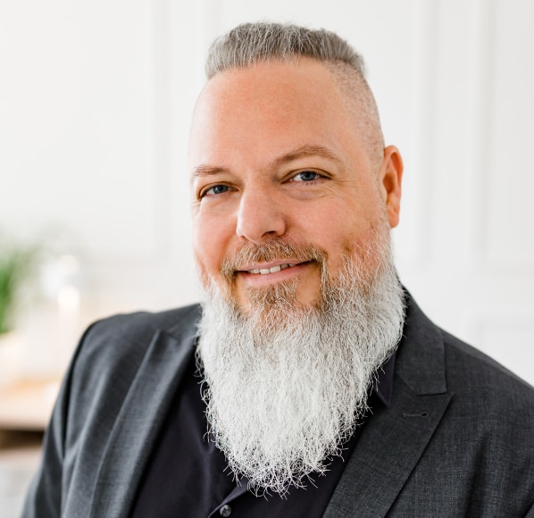 Portraitfoto von Florian Sandmann-Reetz