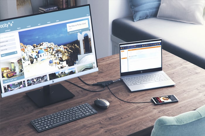 laptop plugged into a monitor