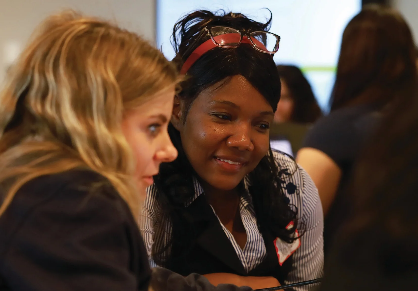 BravenX Fellows in conversation at a program event