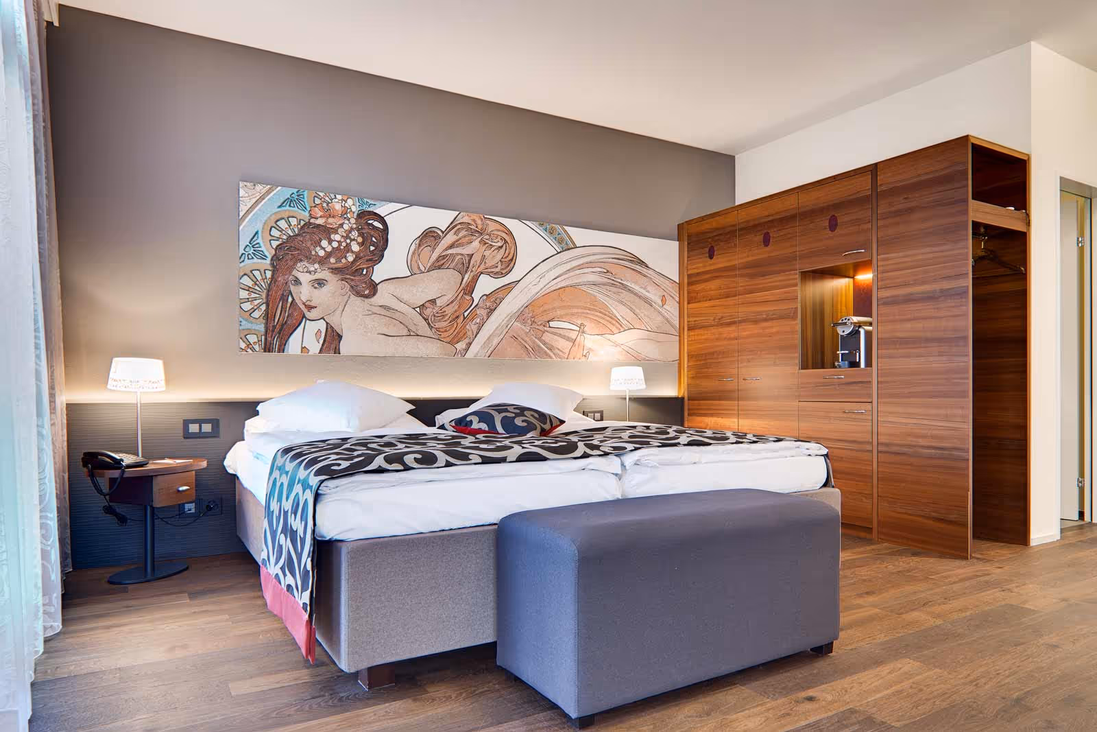 Modern hotel room with picture on the wall