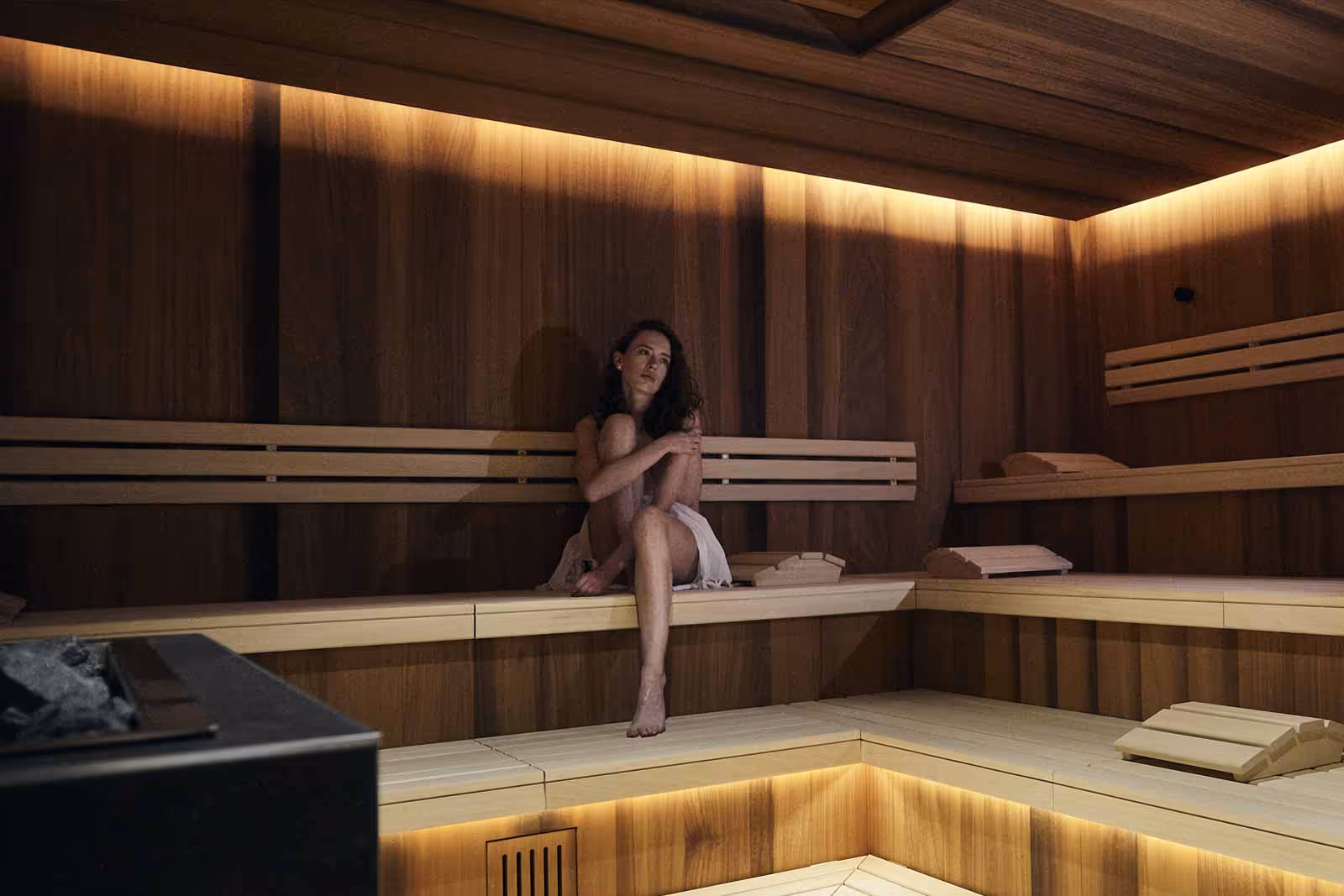 A woman relaxes in the Bio Sauna