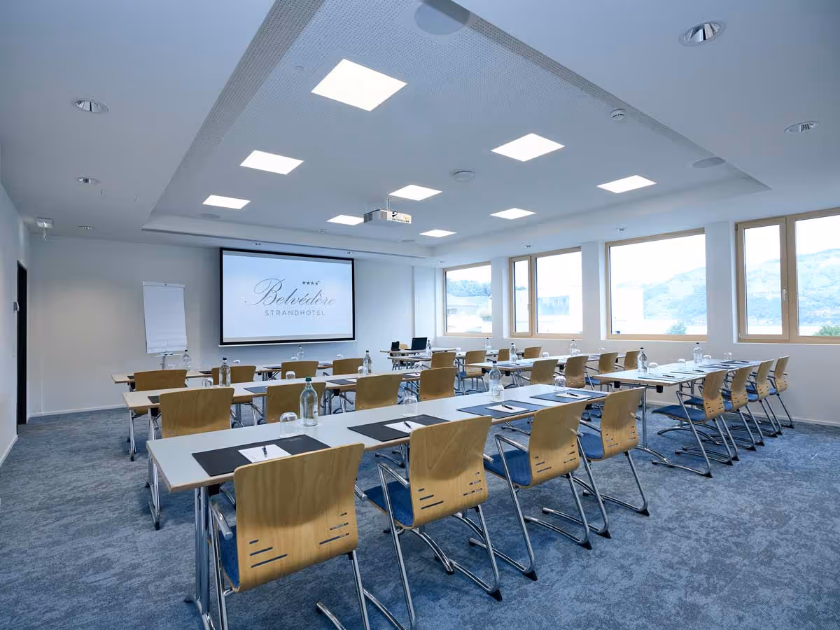 Seminar room with seating for training and projector presentation