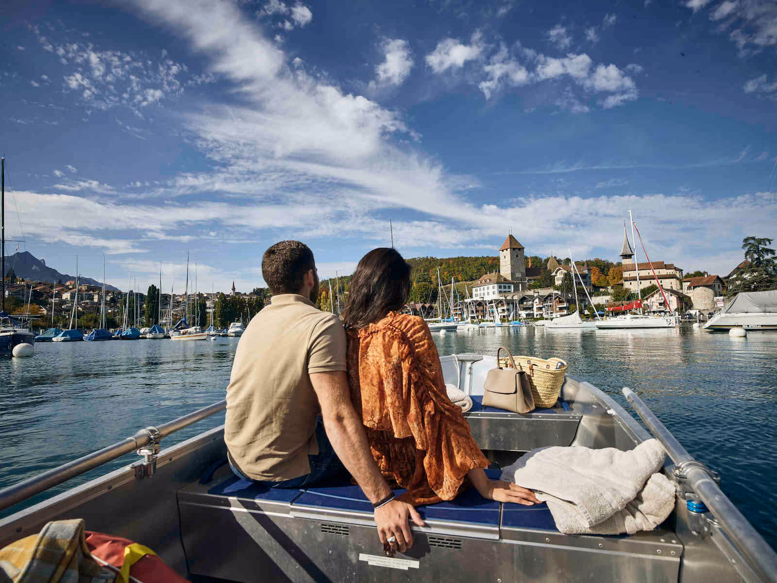 Couple with a rental boat on Lake Thun