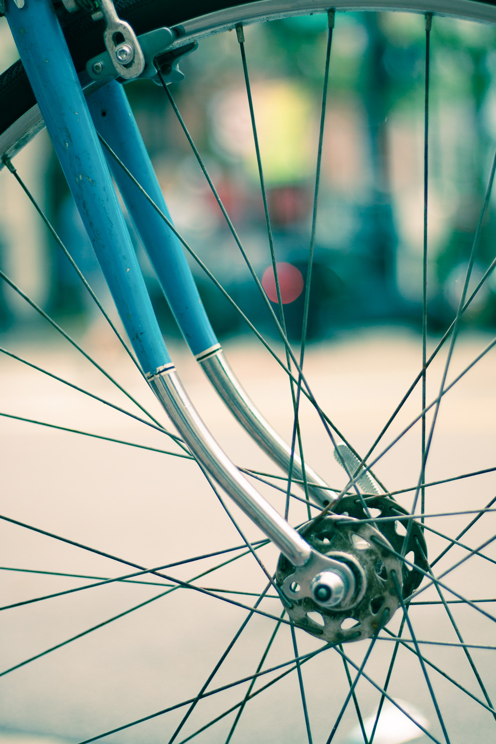 A bike wheel with slit toning applied to the photo