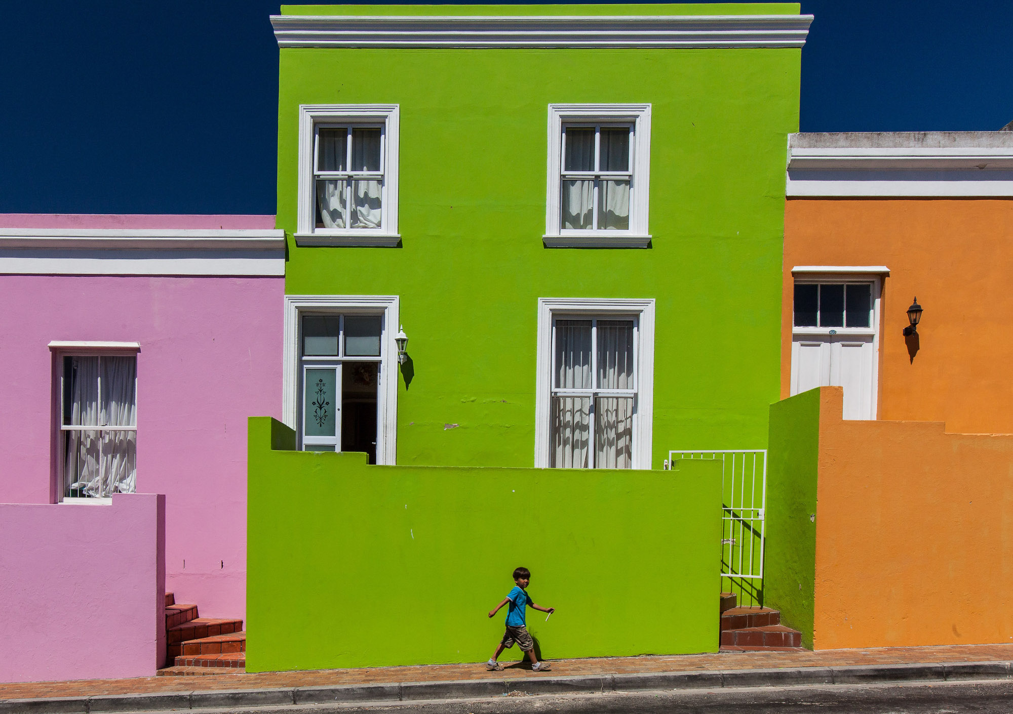 Colourful buildings against a blue sky in Cape Town South Africa