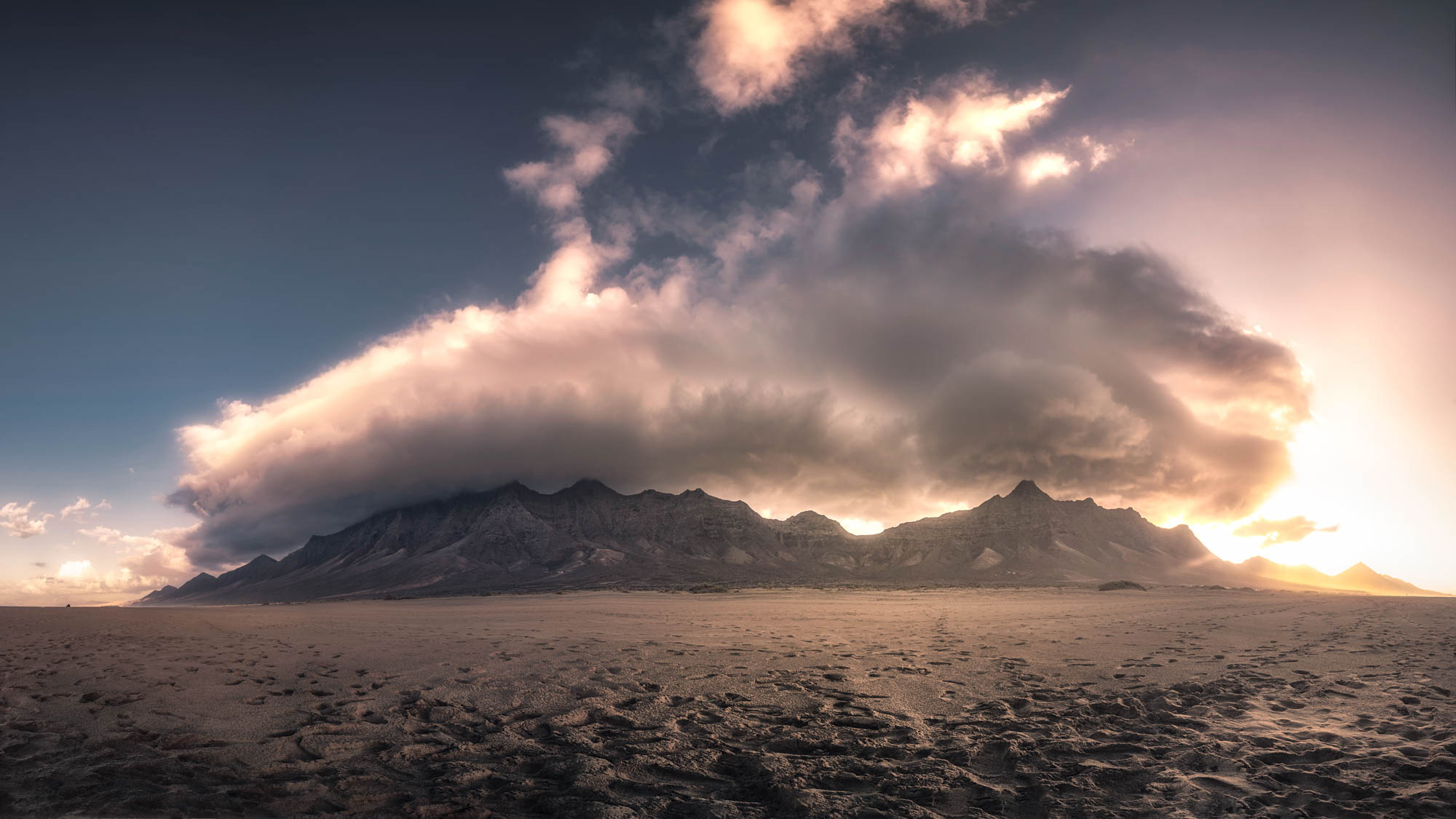 Panoramic to the mountains on cofete with a weird clouds