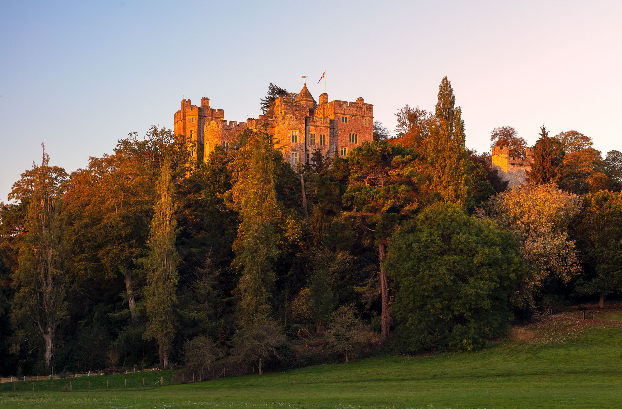 Dunster Castle, England, during the golden hour