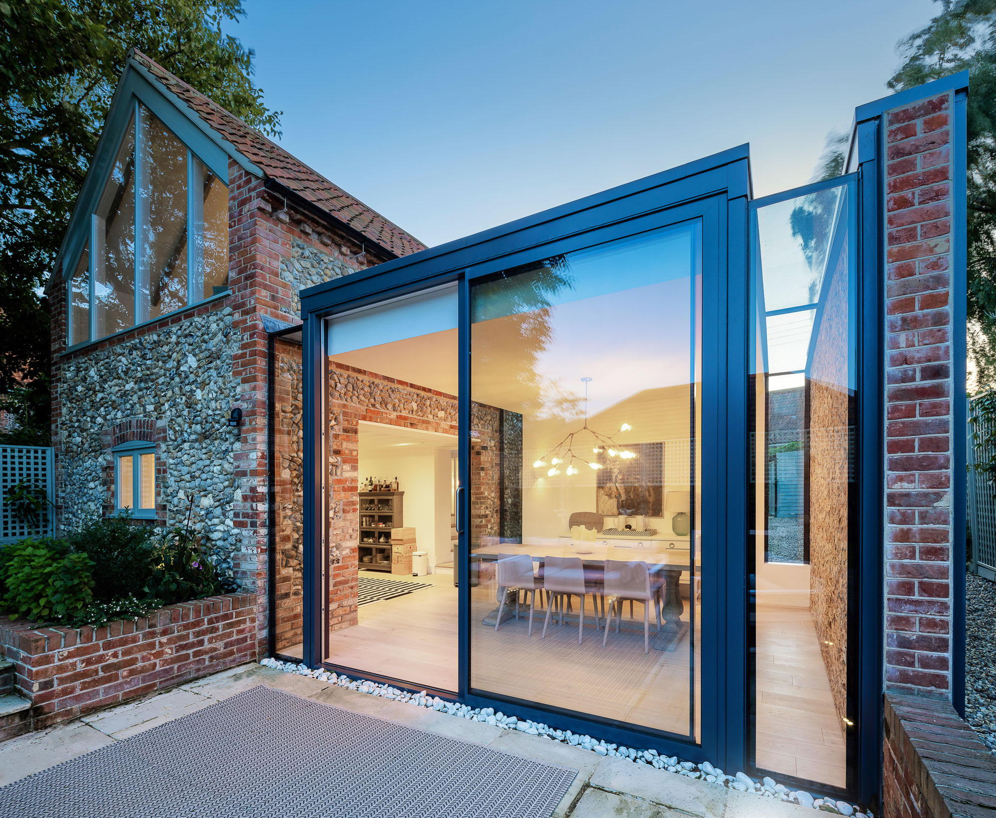 Architectural photography of glass doors leading to a patio captured from a 2-point perspective
