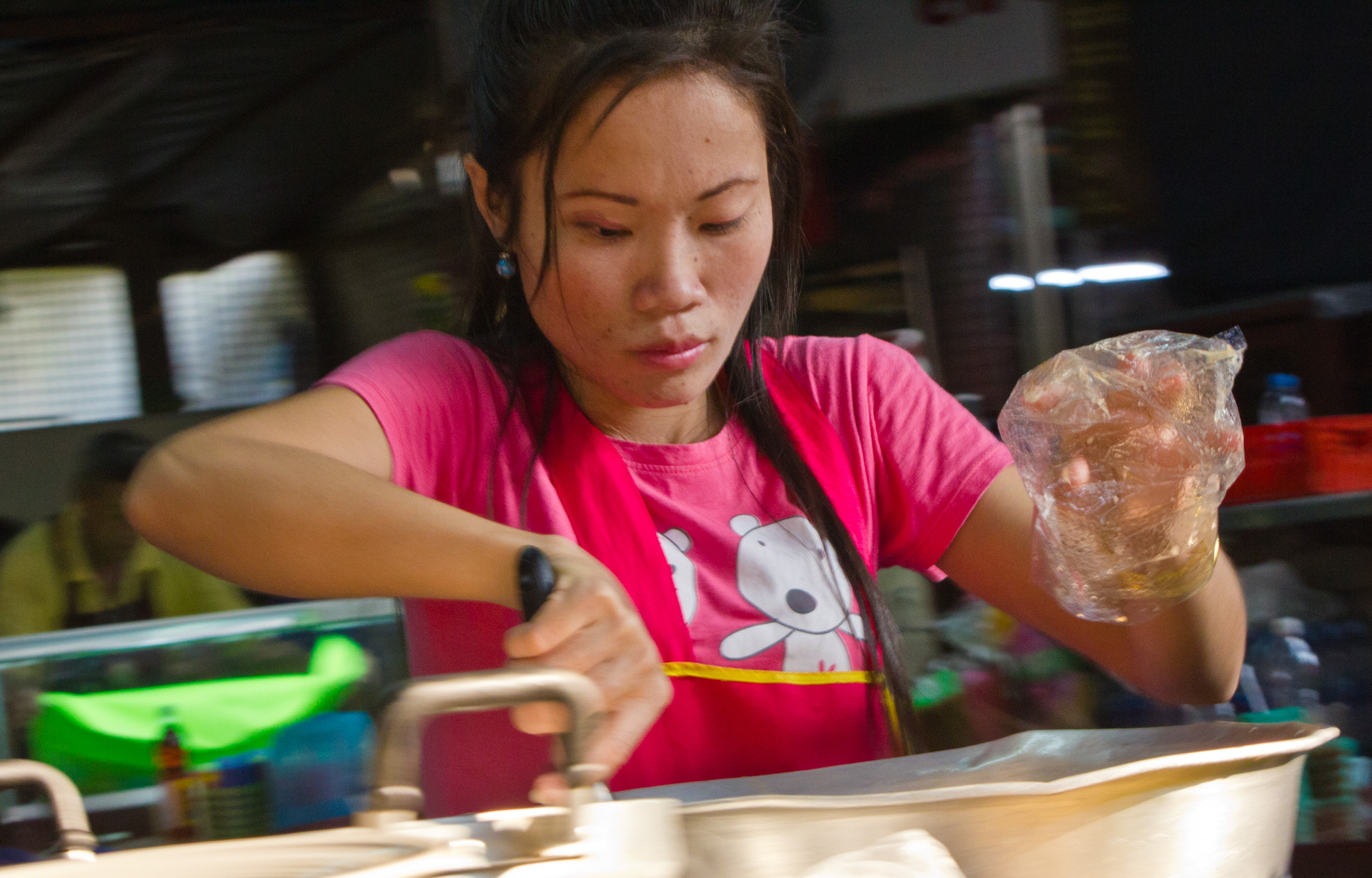 Blurry photo of a street food vendor