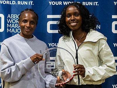 Marcel Hug, Hellen Obiri, Sharon Lokedi and Susannah Scaroni with their trophies