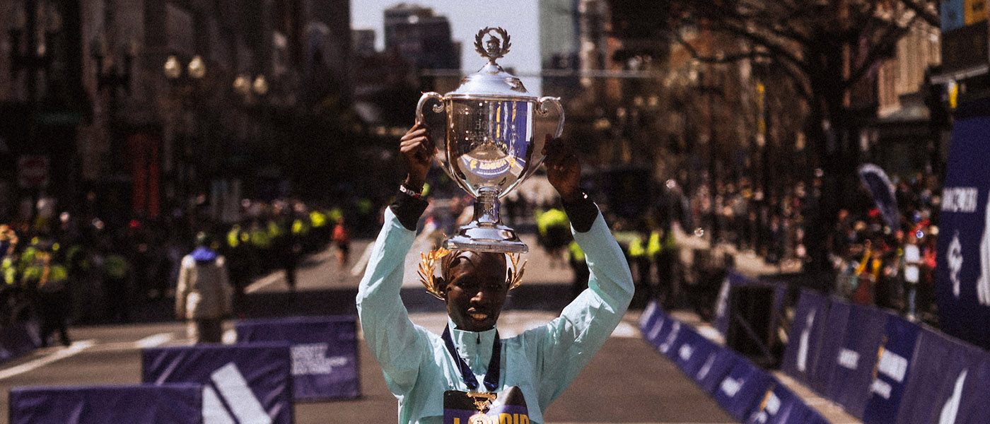 John Korir celebrates winning in Boston in 2025