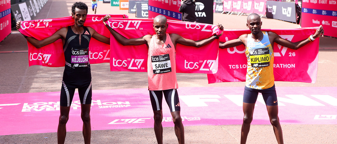 The top three runners from London celebrate
