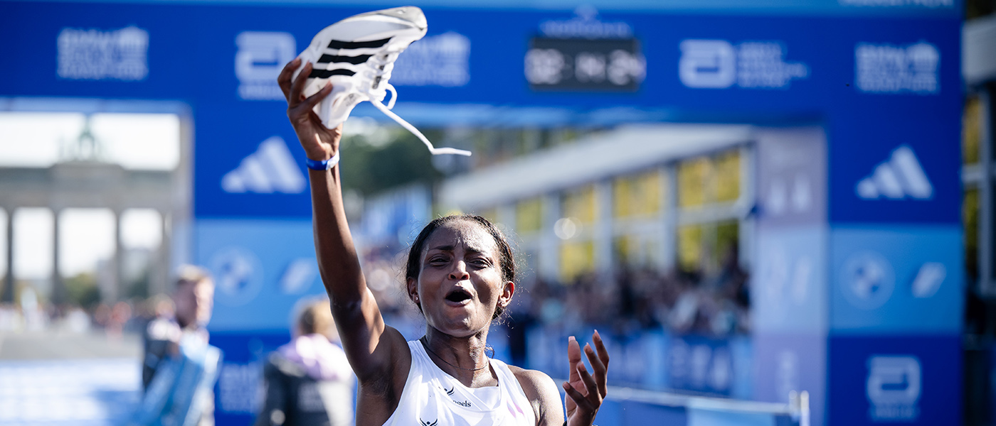 Tigst Assefa celebrates winning in Berlin in 2023