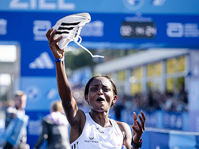 Tigst Assefa celebrates winning in Berlin in 2023