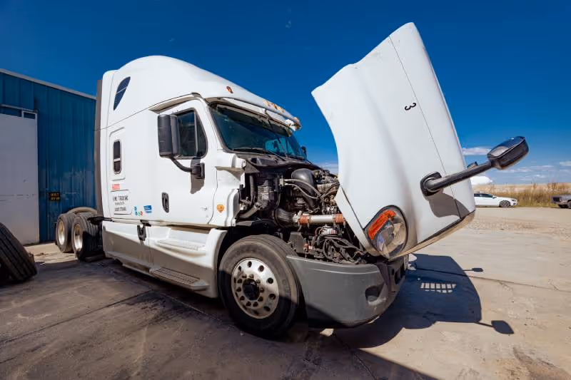 Semi truck in shop for fleet maintenance services
