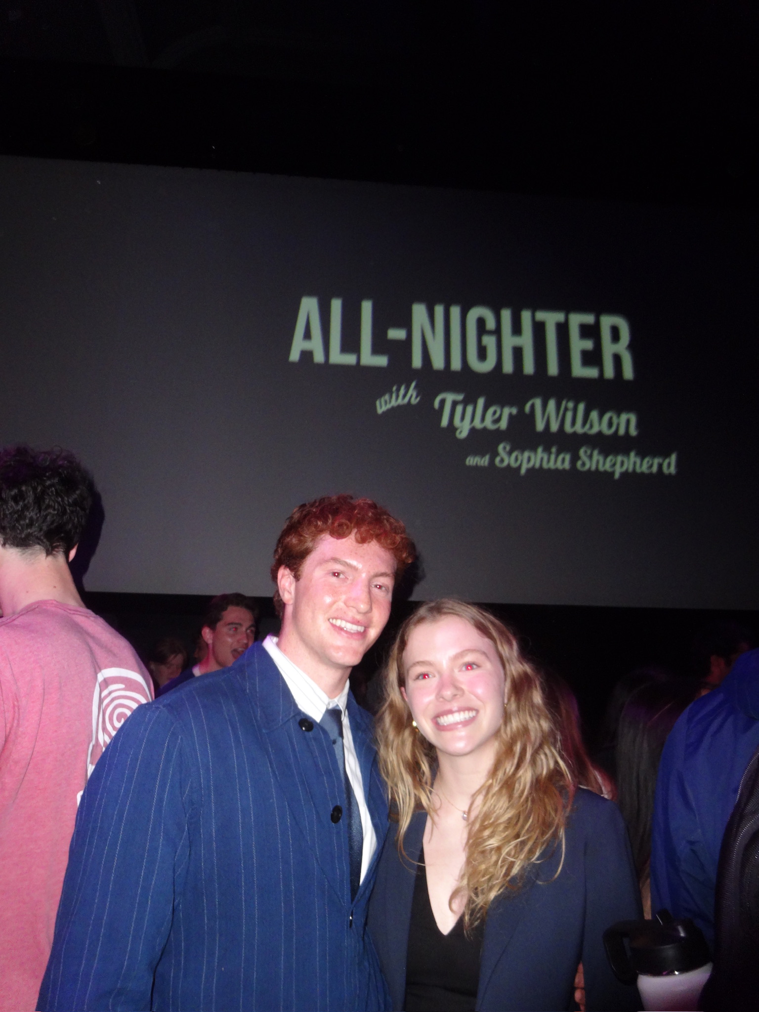Thomas Hughes and Louis Pang, S12 hosts, sitting together on the Frist Theater stage. 