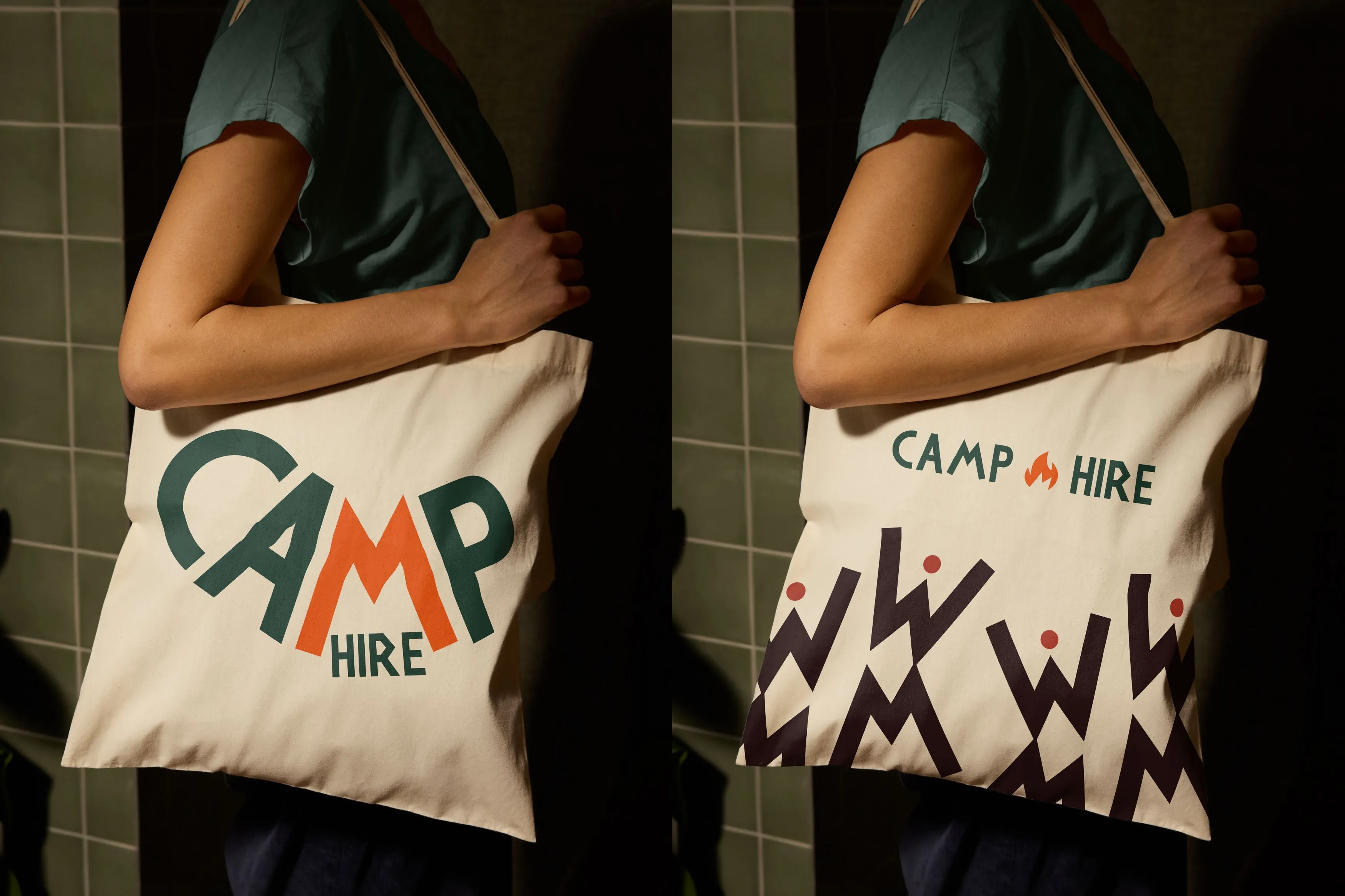 Person holding two beige tote bags with 'Camp Hire' text, one featuring a green and orange stylized logo and the other with a camping flame icon and black geometric pattern.