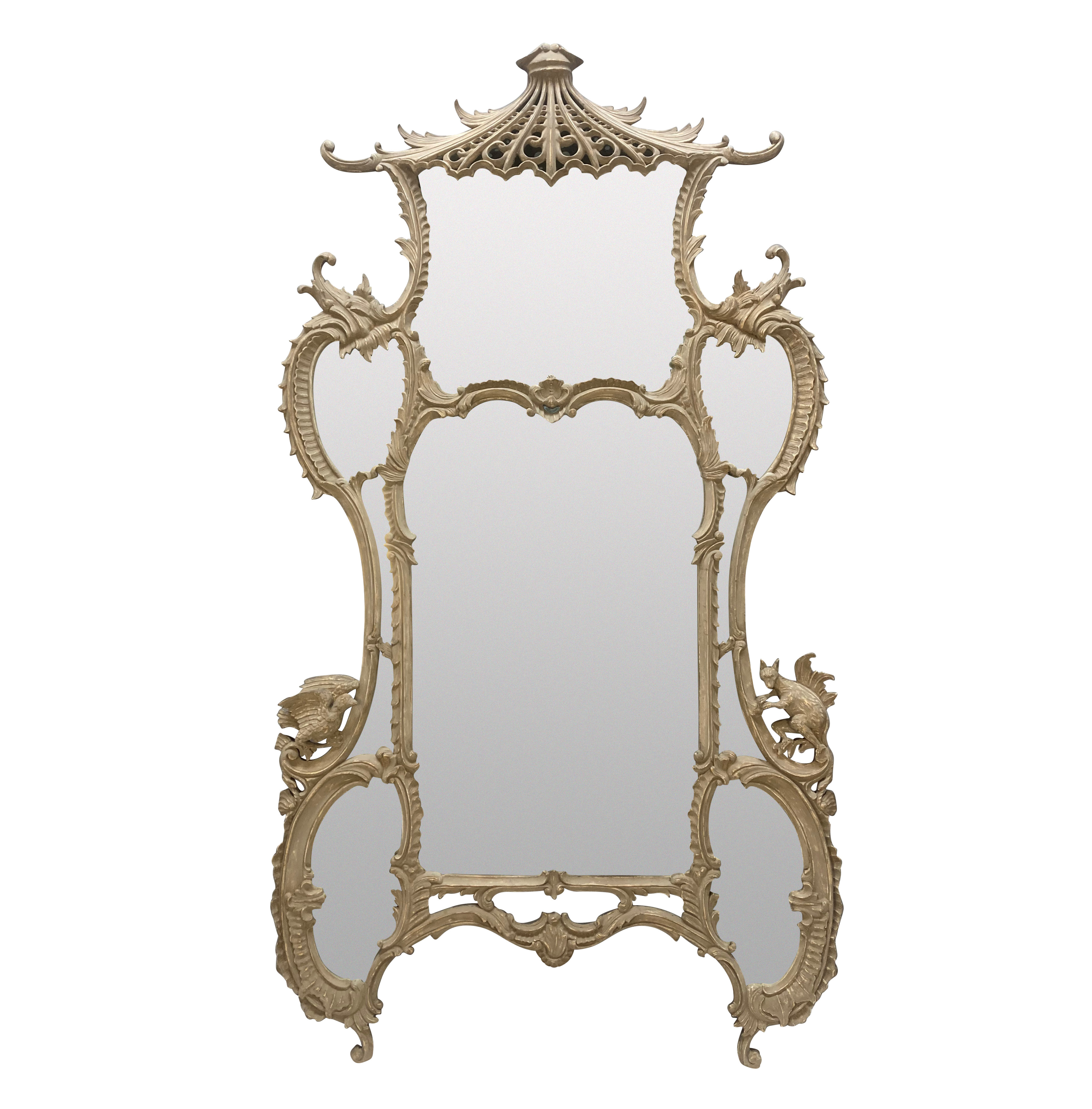 A LARGE PAINTED CHIPPENDALE STYLE SEGMENTED MIRROR
