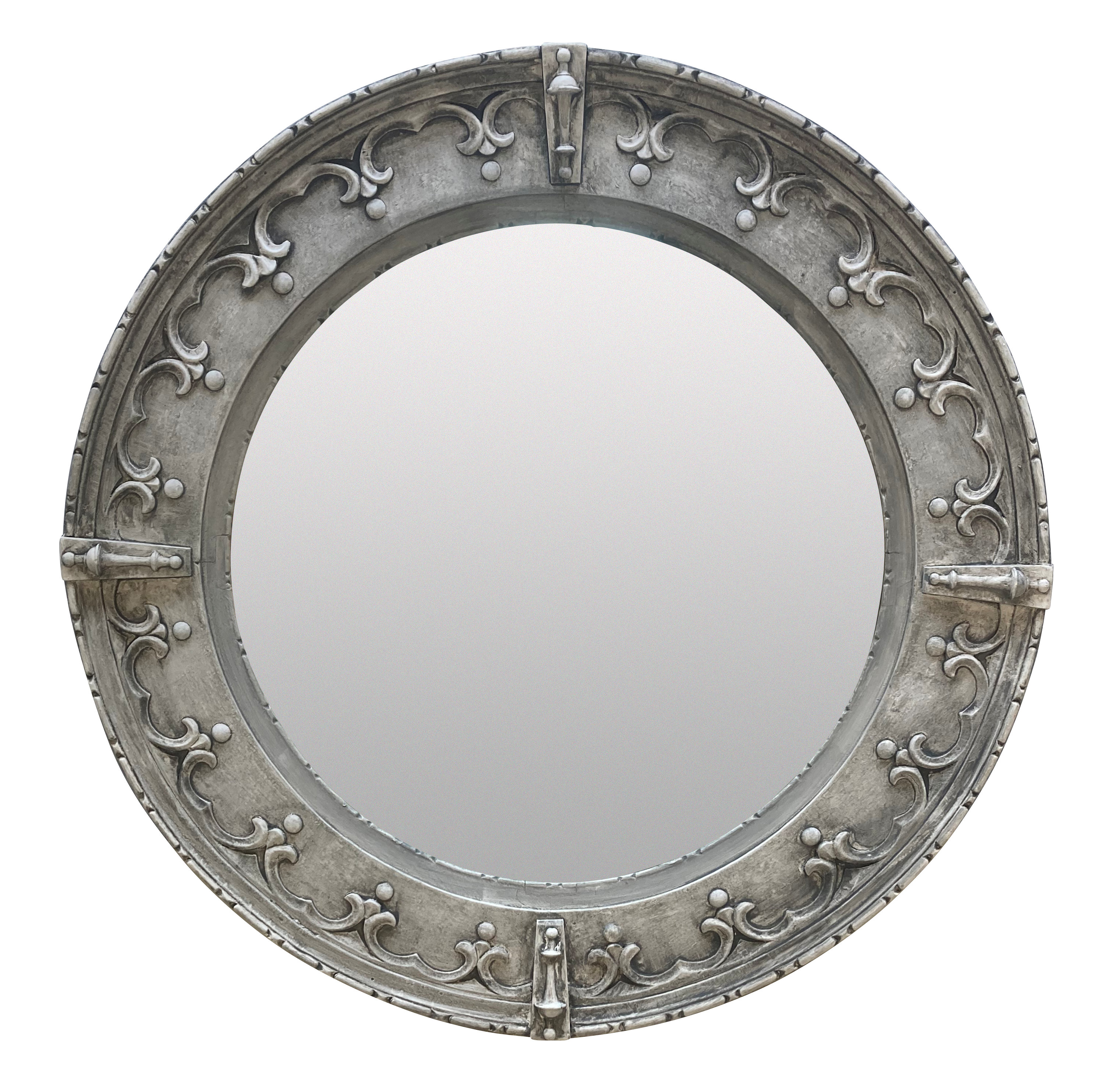 AN ENGLISH CIRCULAR GOTHIC MIRROR IN OAK & GESSO