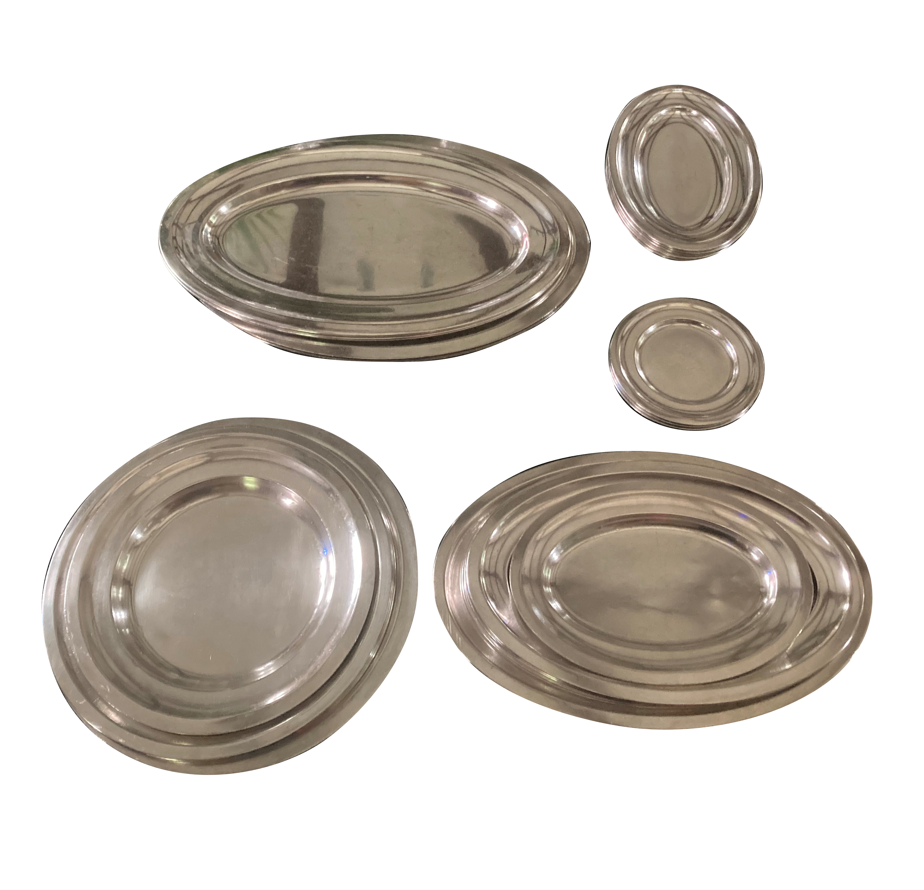 A LARGE COLLECTION OF TWENTY THREE SILVER SERVING PLATTERS
