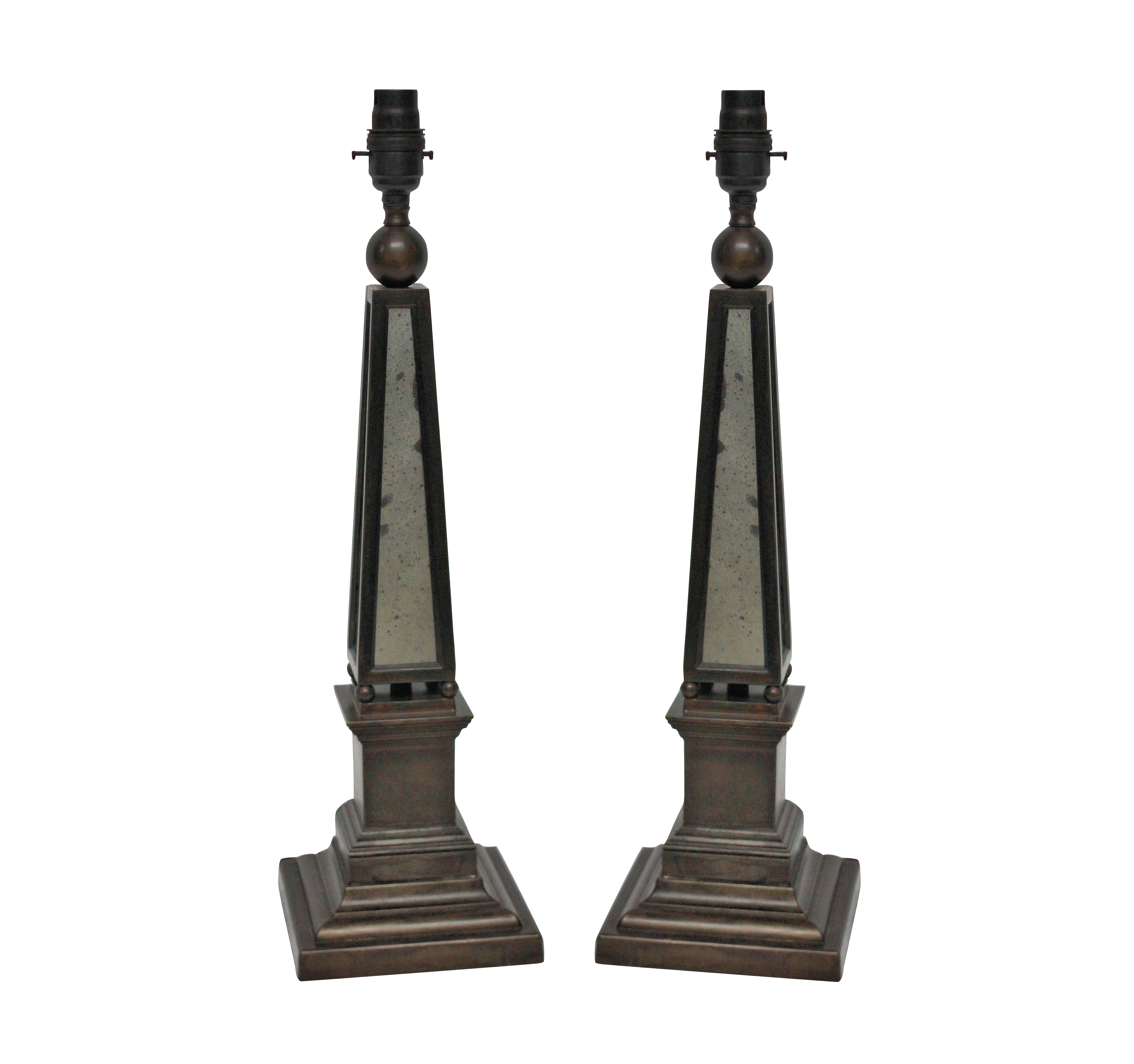 A PAIR OF OBELISK LAMPS WITH MIRROR PANELS