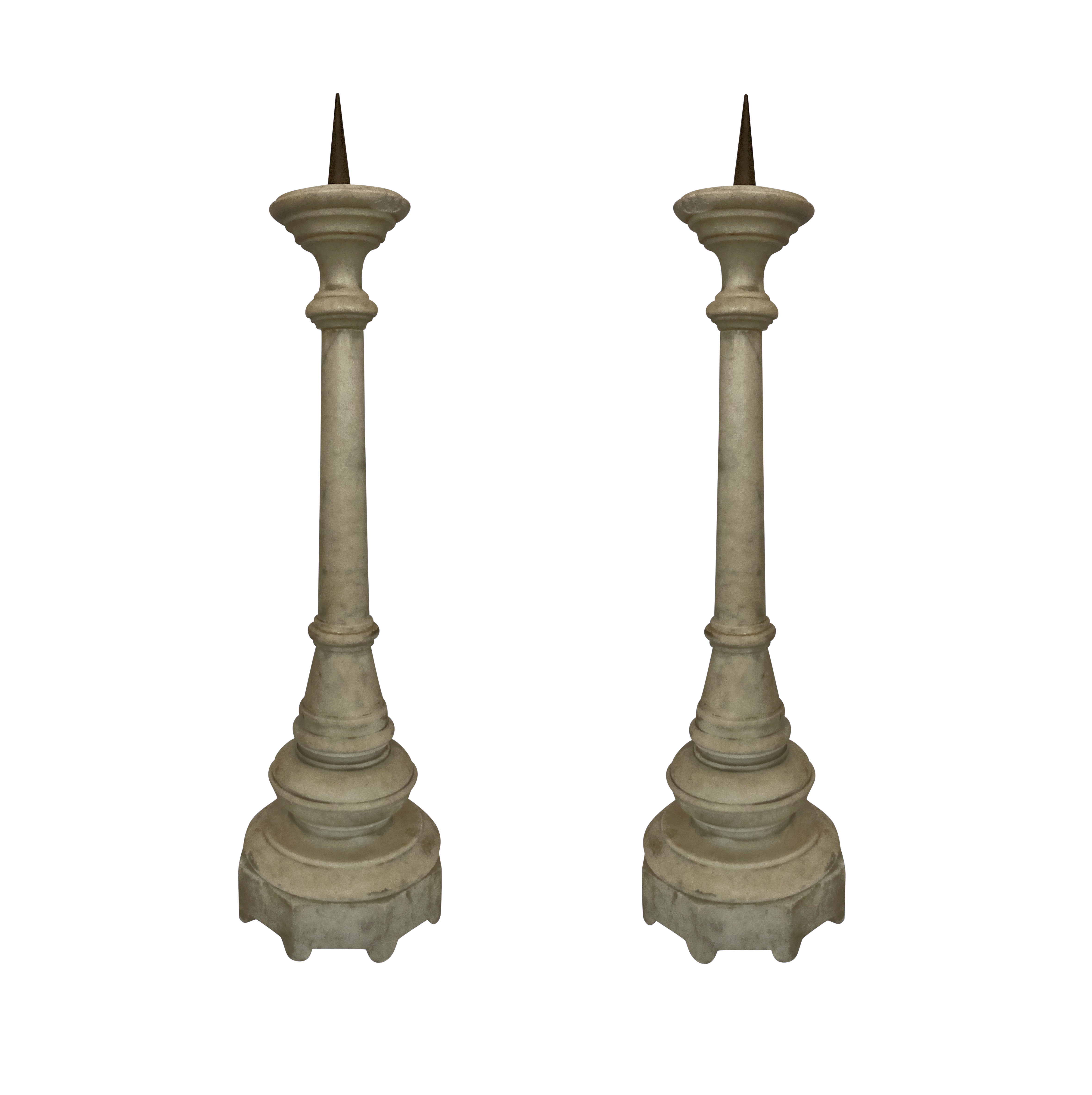 A PAIR OF FLEMISH MARBLE PRICKET STICKS