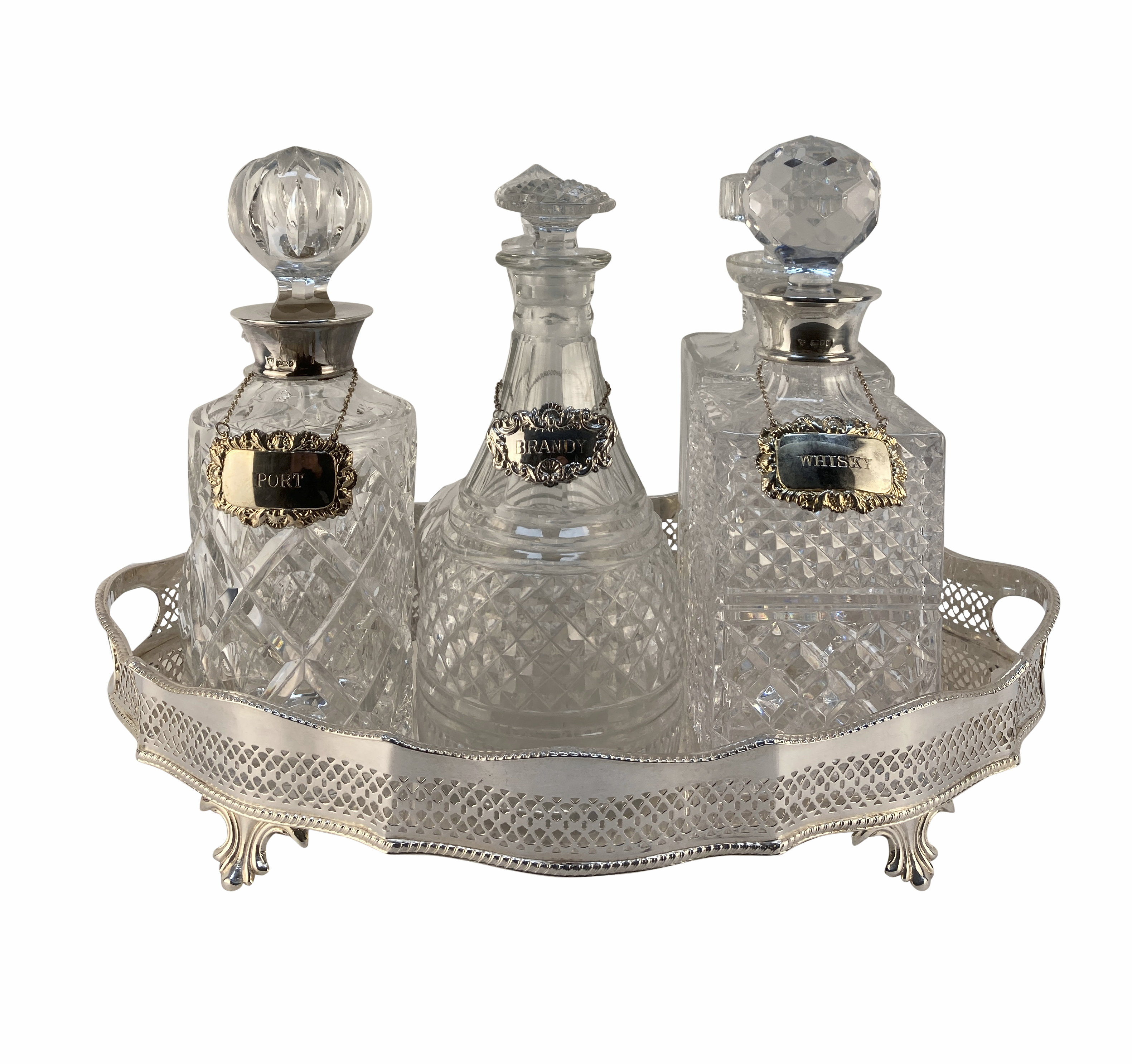 A SILVER DRINKS TRAY WITH DECANTERS, SOME WITH STERLING SILVER COLLARS