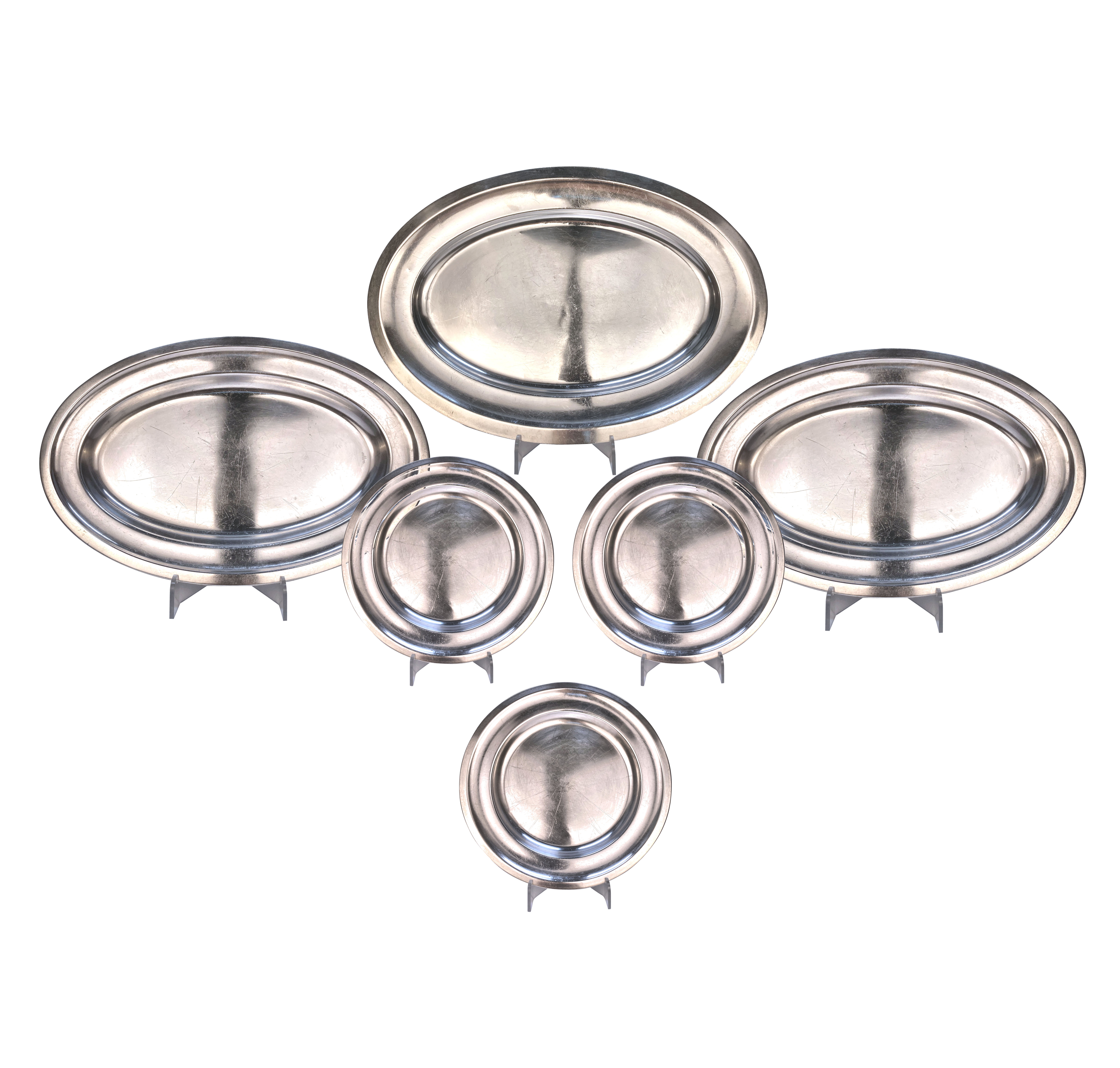 A COLLECTION OF THIRTEEN SILVER SERVING PLATTERS