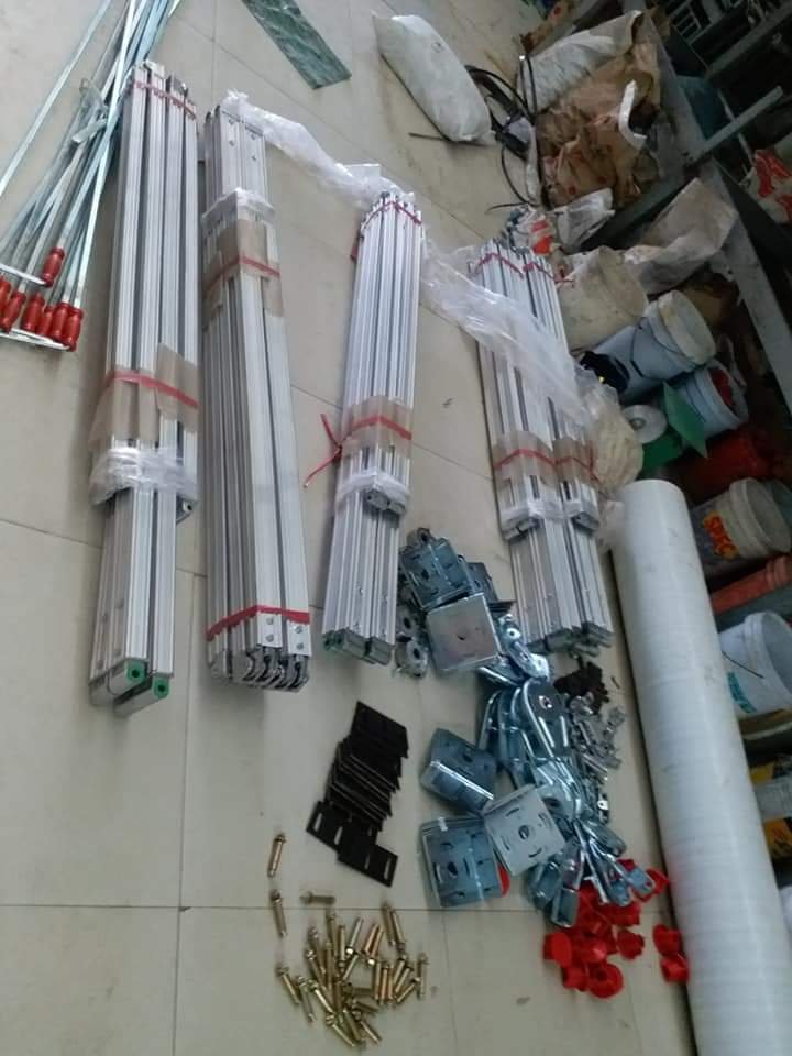 giá bán bạt che nắng mưa tự cuốn - rèm che nắng mưa giá rẻ