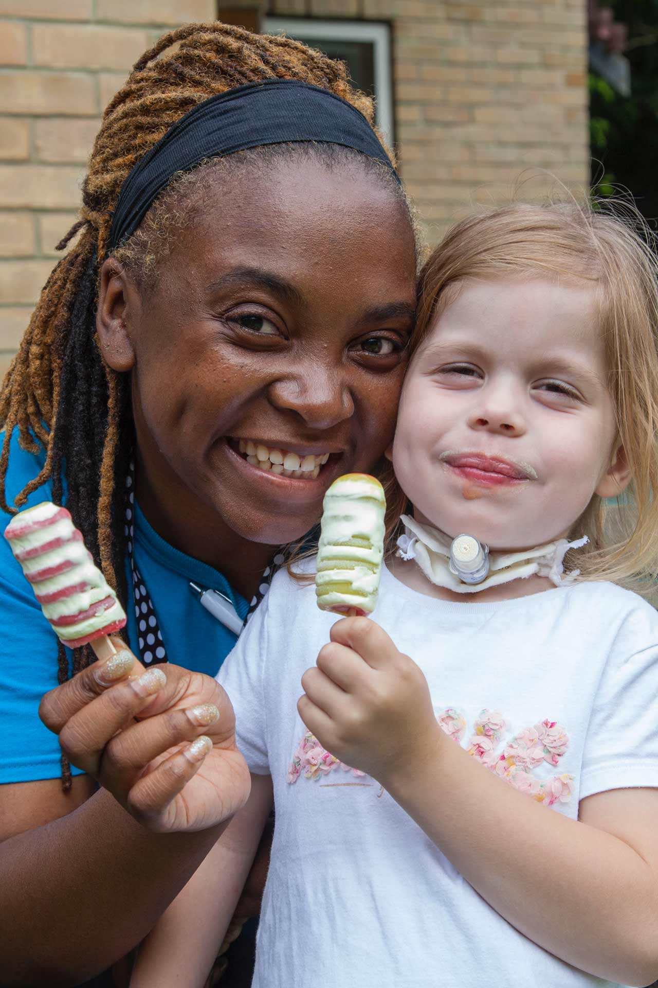 Alexis and Robin holding an icecream