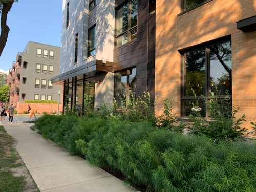 Part of the historic Yards District, Quarter Row connects to other notable housing projects completed by Saiki Design in the same neighborhood and features an eclectic mix of vibrant social spaces, tree-lined walks and industrially derived details.