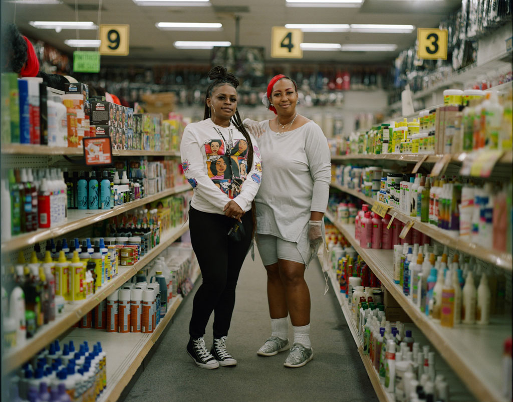 Yaya and Angela, employees of Make More Beautiful beauty supply store in East Point, GA.