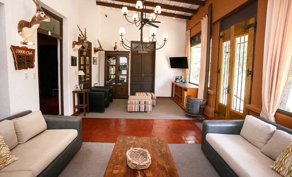 Front room with sofas and colonial furniture