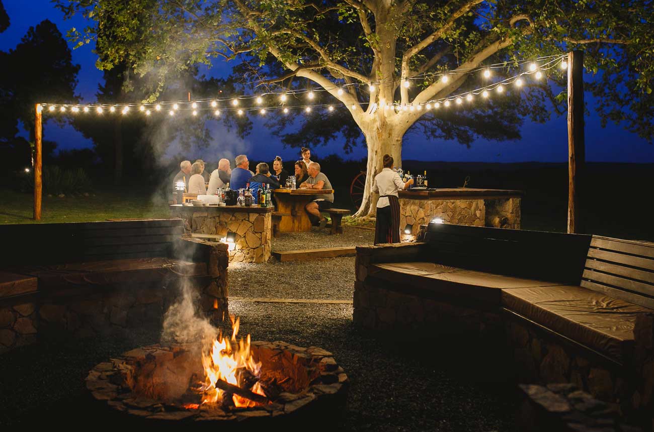 Evening by the fire pit at Sierra Brava Lodge