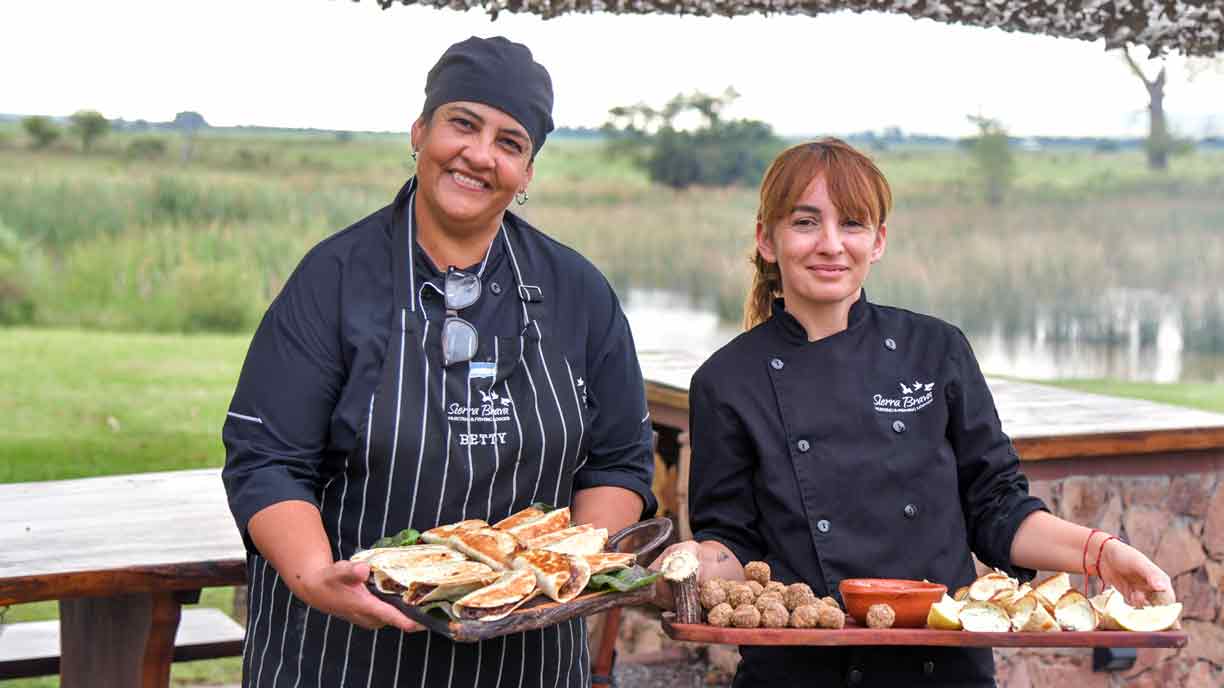 Chefs presenting homemade food at Sierra Brava Lodge
