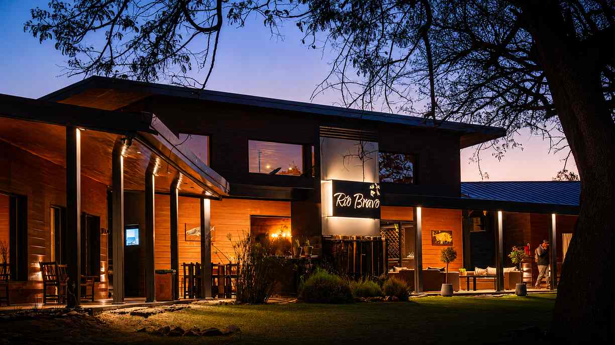 Rio Bravo Lodge exterior at dusk