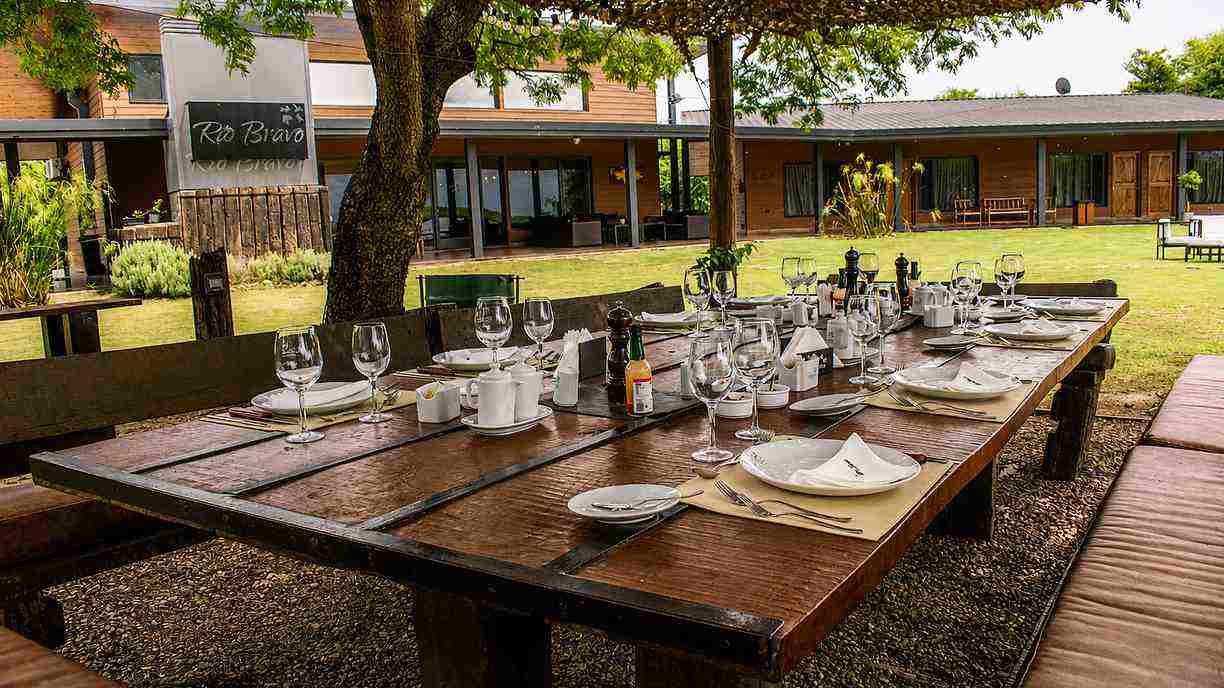 Outdoor dining area at Rio Bravo Lodge