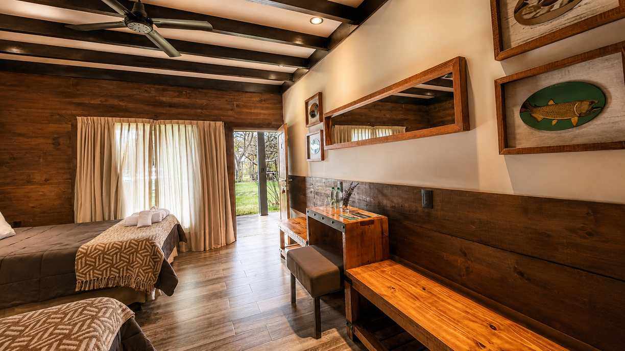 Warm wood bedroom at Rio Bravo Lodge