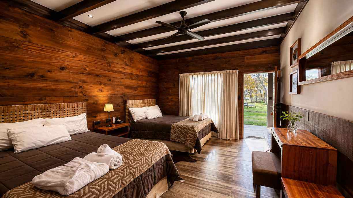 Rustic room with garden view at Rio Bravo Lodge