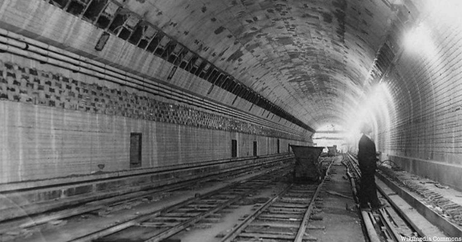 A black and white photograph of the Lincoln Tunnel.
