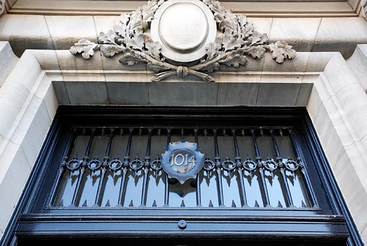 Close up image of the ornate stone detail above the entrance to 1014 Space.